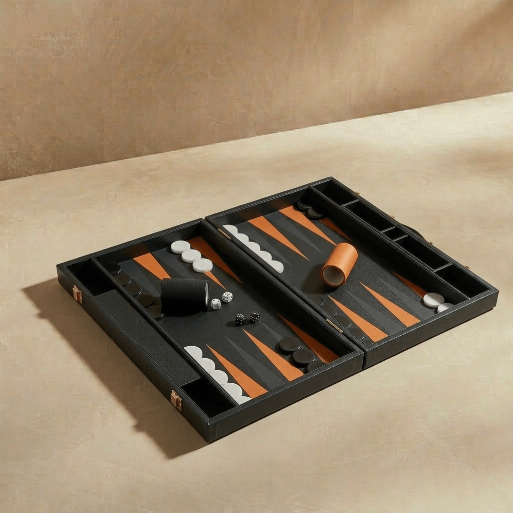 Backgammon set on a beige surface with a neutral background