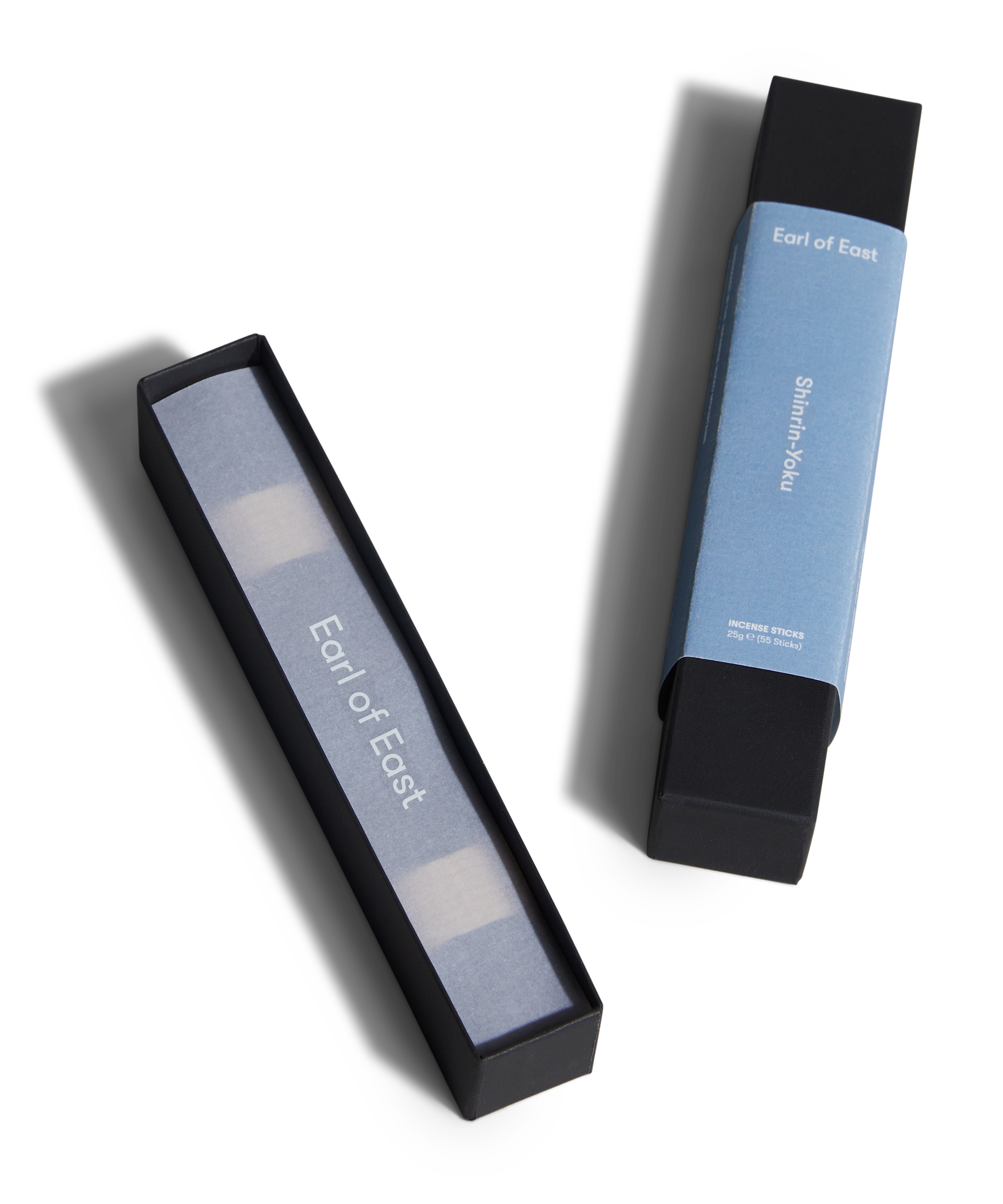 Two black and blue cosmetic products with 'Earl of East' branding on a white background